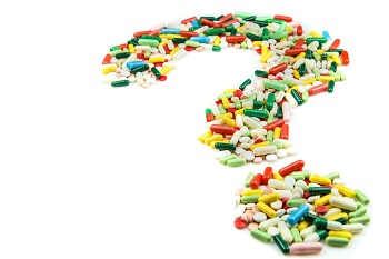 image of question mark made up of assorted pills
